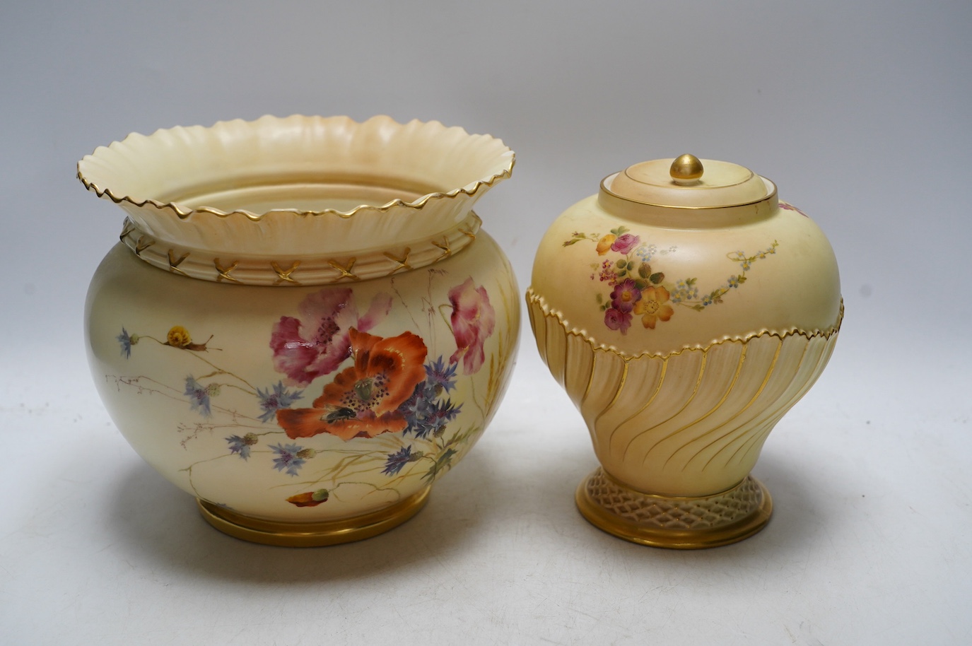 A Worcester blush ivory floral jardiniere, 1651, and a jar and cover, 1720, largest 17cm high. Condition - good, jardiniere with a chip to top rim